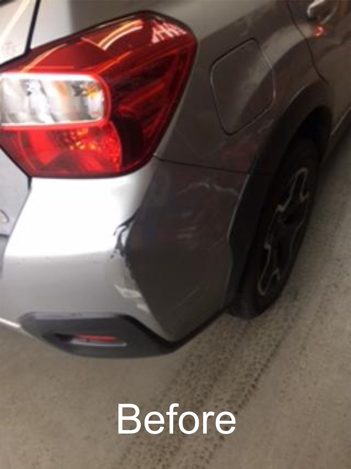 Damage to the rear of a silver car before its bodywork repair